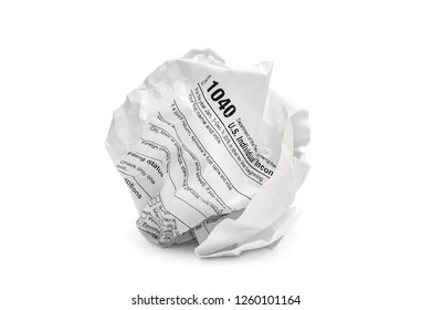 Crumpled Sheet Of Tax Form On White.