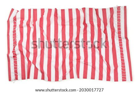 Crumpled striped beach towel isolated on white, top view