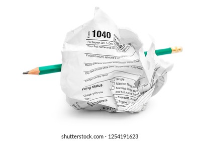 Crumpled Tax Form With Pencil On White.