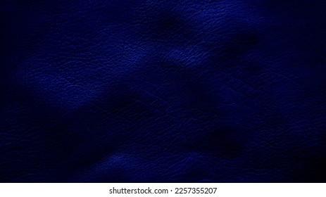 Crumpled texture of dark blue cowhide, close up. Navy blue leather background. - Shutterstock ID 2257355207
