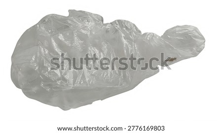A crumpled, translucent plastic bag viewed from above with slight texture details visible on its surface.