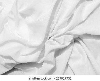 Crumpled white fabric cloth texture