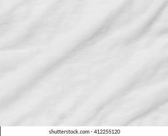 Crumpled white fabric cloth texture