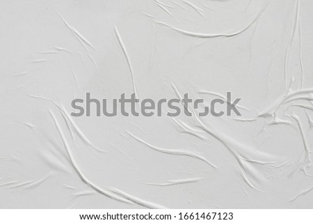 Crumpled white paper. Abstract background for the designer.
