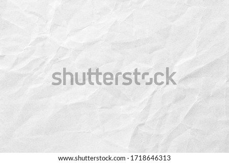 Crumpled white paper background texture
