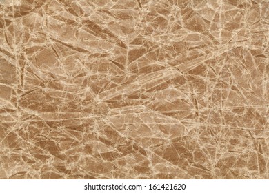 Crumpled, Wrinkled And Creased Brown Wax Paper Background