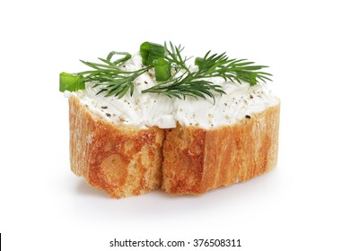 crunchy baguette slice with cream cheese and herbs isolated