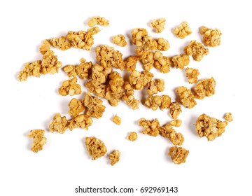  Crunchy granola, muesli pile with nuts isolated on white background, top view