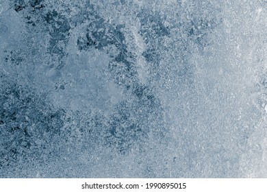 Crunchy Ice Texture Crystal Blue Tone Background. The Textured Cold Frosty Surface Of The Ice.