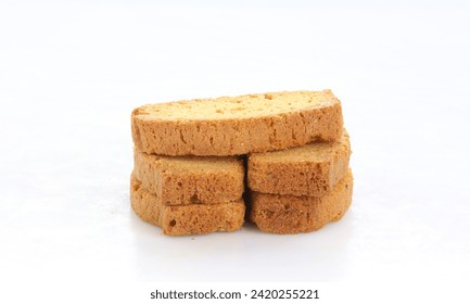 Crunchy Rusk or Toast for healthy life. Rusks creating a domino effect isolated on a white background slices of crispy toast-like bread,toast biscuits.