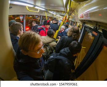A crush or crowd of people in public transport. Bus, tram or trolley. Moscow October 28, 2019