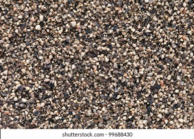 Crushed  Black Pepper (Piper Nigrum) Texture, Full Frame Background. Used As A Spice In Cuisines All Over The World. The Plant Is Also Used In Medicine.