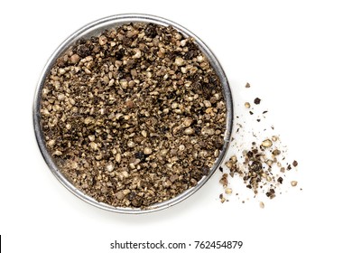 Crushed Black Peppercorns, Top View, Isolated On White.