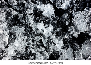 Crushed Ice Pattern On Black Background. Close Up