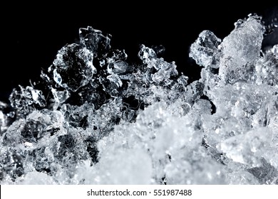 Crushed Ice Pattern On Black Background. Close Up