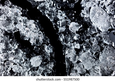 Crushed Ice Pattern On Black Background. Close Up