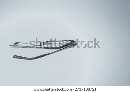 A crushed pair of eye glasses mangled.