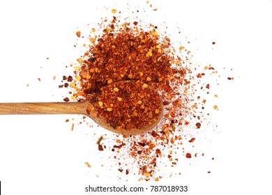 Crushed Red Cayenne Pepper, Dried Chili Flakes, Seeds Pile And Wooden Spoon Isolated On White Background