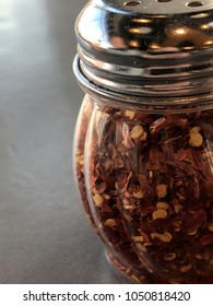 Crushed Red Pepper Flakes In A Shaker.