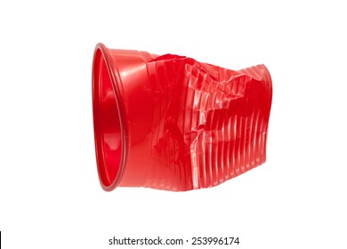 Crushed Red Plastic Cup On A White Background