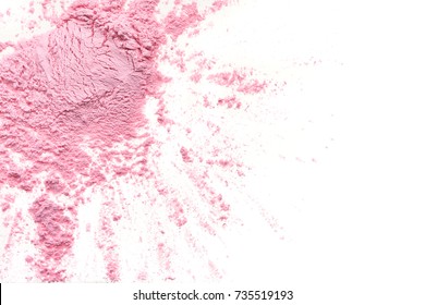 Crushed texture of pink eye shadow isolated on white background. Texture of pink powder on white background