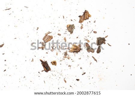 Crushed tree bark remains macro shot, small wood pieces splints isolated on white background