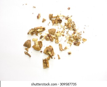 Crushed Walnuts On A White Background