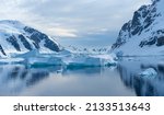 Crusing the Lemaire Channel among drifting icebergs, Antarctic Peninsula. Antarctica