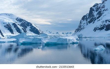 Crusing the Lemaire Channel among drifting icebergs, Antarctic Peninsula. Antarctica - Shutterstock ID 2133513643