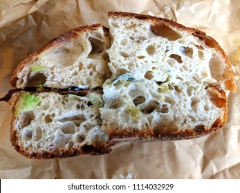 Crusty Doorstop Sandwich In Wax Paper