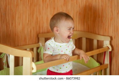 Crying Baby Of One Year Old  In Crib