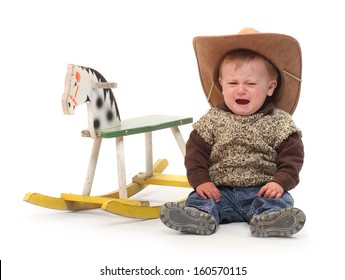 Crying Kid After Accident On A Rocking Horse.