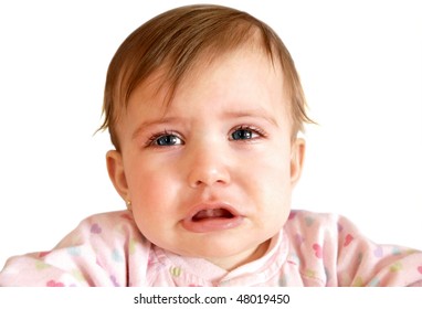 Crying little baby girl with watery blue eye detail isoalted on white background.