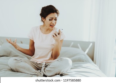 Crying Lonely Woman Phone Call. Bedroom Concept. Flowed Mascara. Unhappy Holiday. Sad Weekend. Tears On The Face. Sunny Day. Disappointed Girl. Spoiled Makeup. Female In A Bad Mood. - Powered by Shutterstock