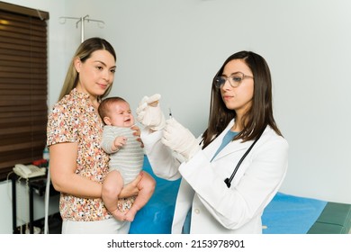 Crying Newborn Baby Getting A Vaccine Shot At The Hospital. Sick Baby Afraid Of An Injection