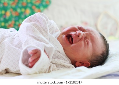 Crying Newborn Baby With Narrow Focus