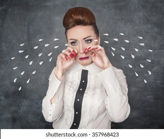 Crying Sad Woman On The Blackboard Background