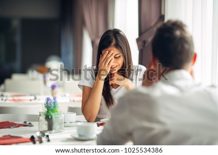 Crying stressed woman reaction to negative event,handling bad news.Breaking up long relationship.Emotional woman in grief,emotional pain.Couple fighting,marriage problems arguing.Domestic violence Imagine de stoc © 