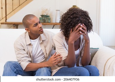 Crying woman not listening to his excuses at home in the living room - Shutterstock ID 206407936