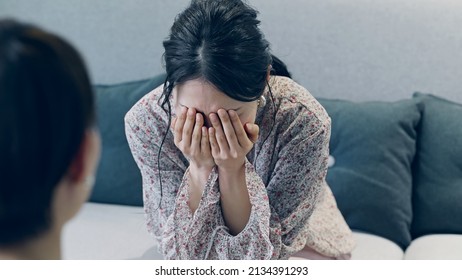 Crying woman in the room.  - Powered by Shutterstock