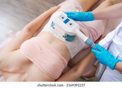 Cryolipolysis. Hardware cosmetology. Body care. Non surgical sculptures. Body contouring treatment, anti-clulite and anti-fat therapy in a beauty salon. Woman on procedure - Shutterstock ID 2169392237