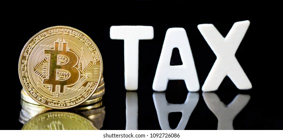 Crypto Currency  Bitcoin Coin With TAX Message ,Concept Determining The Tax Law Of Digital Money.