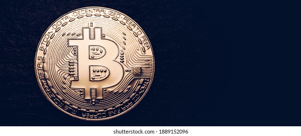 Crypto currency golden coin with bitcoin symbol on isolated on black background. Bitcoin Coin on black background. Bitcoin cryptocurrency.  Cryptocurrency Coin Concept.