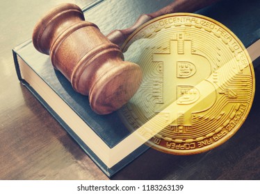 Crypto currency law concept, gavel and bitcoin symbol.