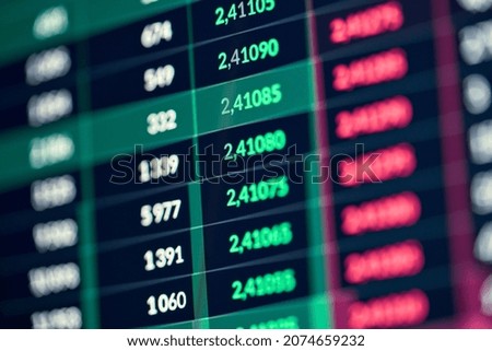 Crypto stock exchange online trading tickers numbers figures volatility shares price orders digital data on cryptocurrency trade financial market platform board. Computer screen closeup background.