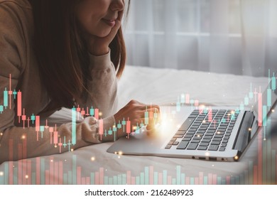 Crypto trader investor analyst looking at screen analyzing financial graph data on laptop in bed. Cryptocurrency, Stocks, Investing, Business finance technology, digital marketing, E-business concept - Powered by Shutterstock