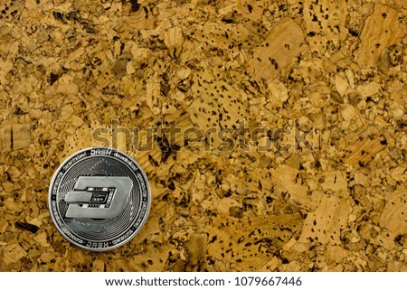Cryptocurrency dashcoin, cork background, Empty space