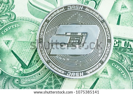 Cryptocurrency Dashcoin. USA dollar baknotes background