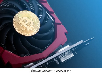 cryptocurrency mining concept with one golden bitcoin on top of a computer performant video card black fan