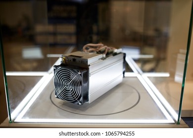 Cryptocurrency mining equipment - ASIC - application specific integrated circuit on farm stand at expo